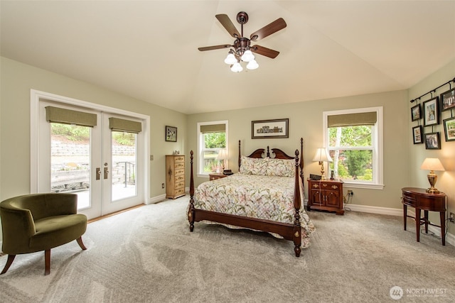1483 Fox Hollow Rd, Sequim, WA 98382 - carpeted bedroom featuring access to outside, french doors, vaulted ceiling, and ceiling fan