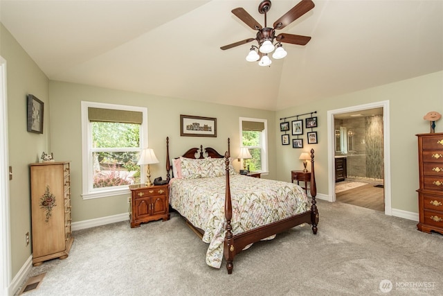 1483 Fox Hollow Rd, Sequim, WA 98382 - bedroom with light carpet, vaulted ceiling, ensuite bath, and a ceiling fan