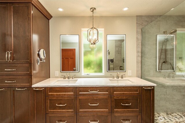 1483 Fox Hollow Rd, Sequim, WA 98382 - full bath featuring double vanity, a tile shower, a chandelier, and recessed lighting