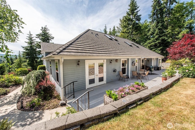 1483 Fox Hollow Rd, Sequim, WA 98382 - rear view of property featuring french doors, a tile roof, and a wooden deck
