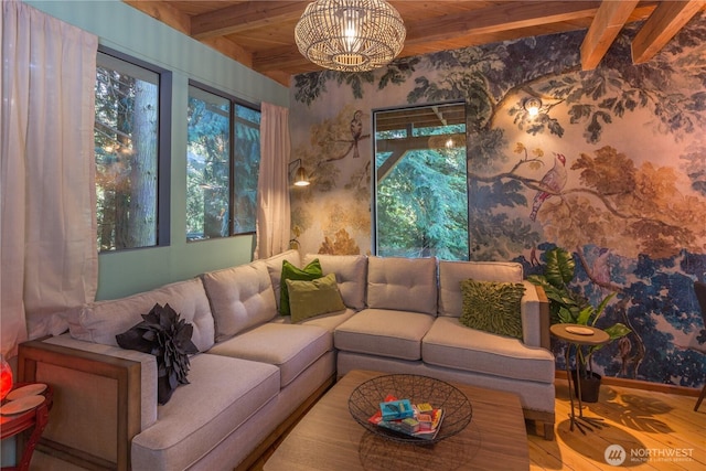 251 Saddle Dr, Port Townsend, WA 98368 - living area with healthy amount of natural light, a wood ceiling with exposed beams, a chandelier, and wood finished floors
