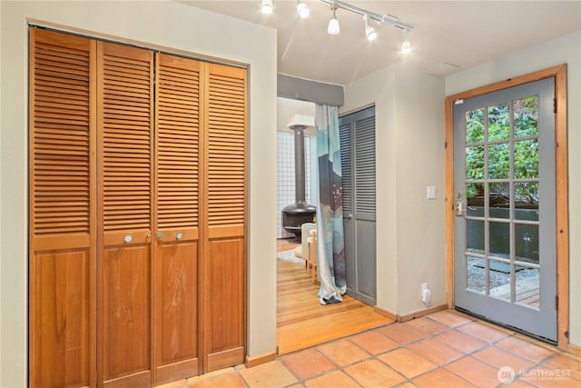 251 Saddle Dr, Port Townsend, WA 98368 - interior space featuring rail lighting and light tile patterned floors
