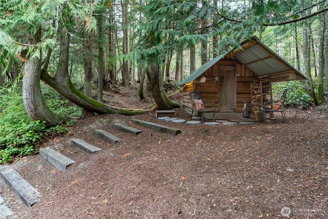 251 Saddle Dr, Port Townsend, WA 98368 - view of yard with an outbuilding and a forest view