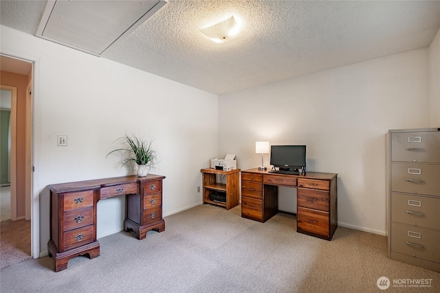 1021 Garden Dr, Lynden, WA 98264 - home office featuring light colored carpet, attic access, and a textured ceiling
