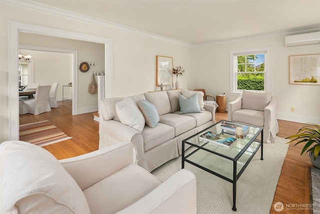 2318 33rd Ave S, Seattle, WA 98144 - living area with a wall mounted AC, a chandelier, ornamental molding, and wood finished floors