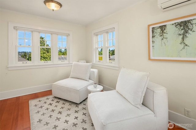 2318 33rd Ave S, Seattle, WA 98144 - living area with wood finished floors and a wall unit AC