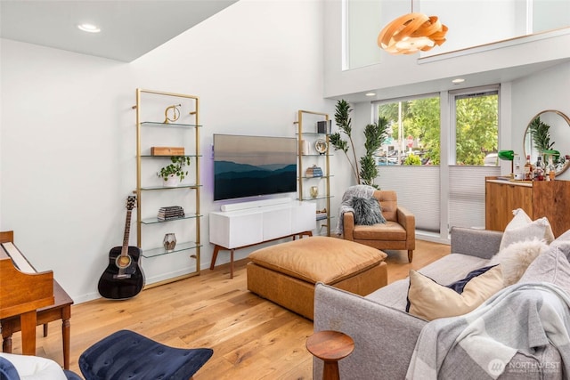 866 NE 96th St, Seattle, WA 98115 - living area with light wood-style flooring and recessed lighting