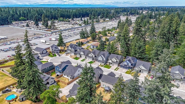 202 191st Street Ct E, Spanaway, WA 98387 - aerial view of property's location featuring a heavily wooded area and nearby suburban area