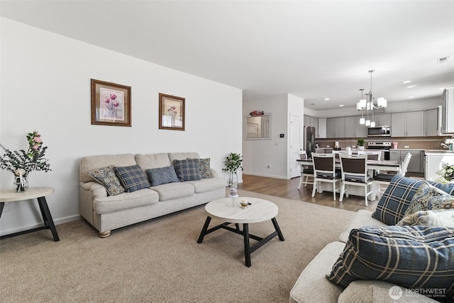 202 191st Street Ct E, Spanaway, WA 98387 - living room featuring a chandelier, recessed lighting, and light wood-style flooring