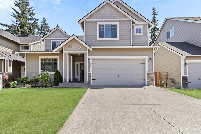 202 191st Street Ct E, Spanaway, WA 98387 - craftsman house with concrete driveway, stone siding, a front lawn, a garage, and board and batten siding