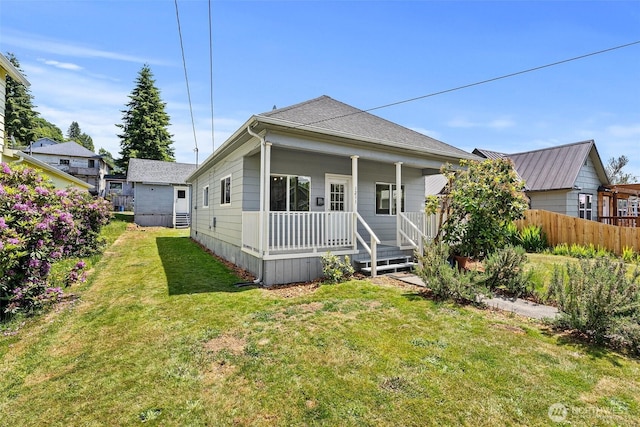 1211 Larch St, Raymond, WA 98577 - rear view of property with a porch