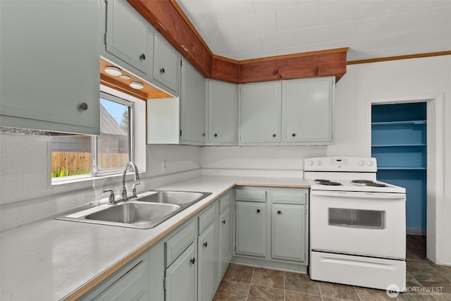 1211 Larch St, Raymond, WA 98577 - kitchen with white electric range oven and light countertops