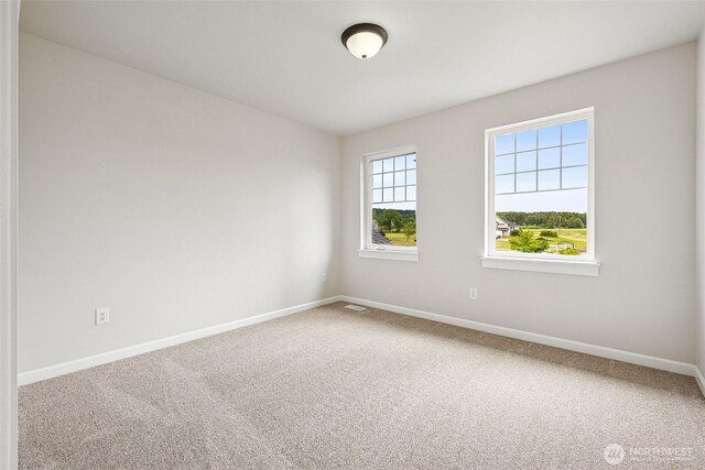 14808 172nd St E, Orting, WA 98360 - empty room featuring carpet flooring