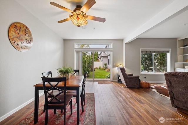 418 17th St SE Unit 9D, Auburn, WA 98002 - dining space featuring healthy amount of natural light, wood finished floors, and a ceiling fan
