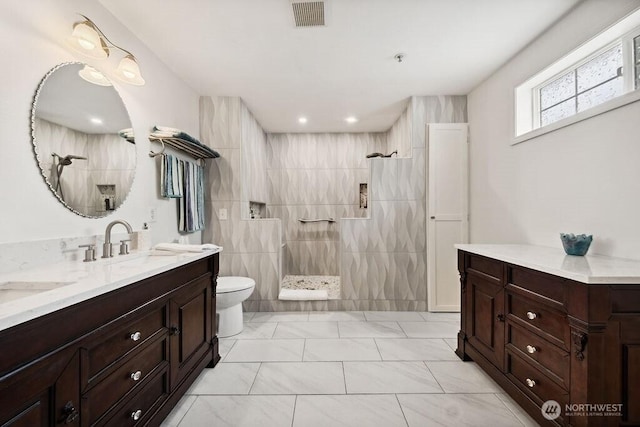 418 17th St SE Unit 9D, Auburn, WA 98002 - full bath featuring walk in shower, double vanity, and marble look tile flooring