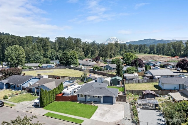 307 Brown St SE, Orting, WA 98360 - aerial perspective of suburban area featuring a mountain backdrop