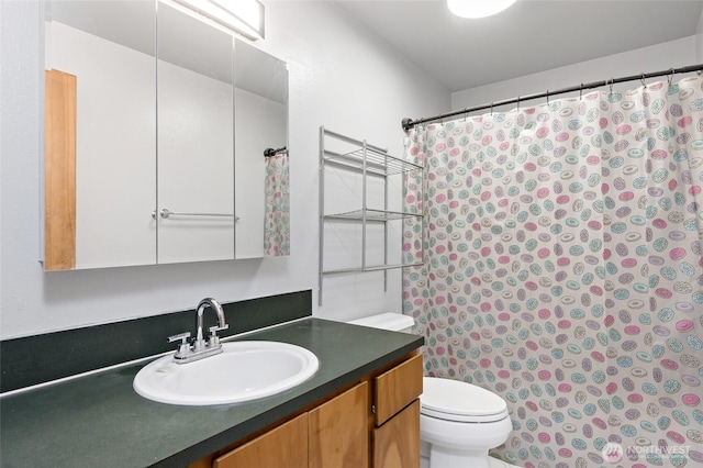 307 Brown St SE, Orting, WA 98360 - bathroom with vanity and curtained shower