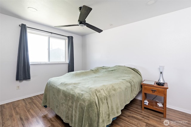 307 Brown St SE, Orting, WA 98360 - bedroom featuring wood finished floors and a ceiling fan