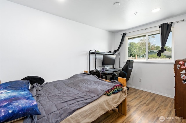 307 Brown St SE, Orting, WA 98360 - bedroom featuring wood finished floors and recessed lighting