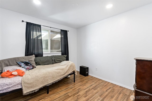 307 Brown St SE, Orting, WA 98360 - bedroom featuring wood finished floors and recessed lighting