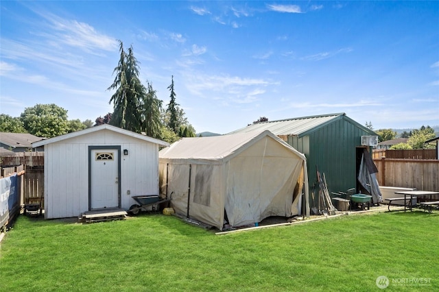 307 Brown St SE, Orting, WA 98360 - view of shed with a fenced backyard