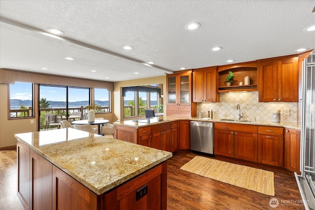 10300 64th Pl W, Mukilteo, WA 98275 - kitchen featuring dishwasher, dark wood-style flooring, light stone counters, decorative backsplash, and a textured ceiling