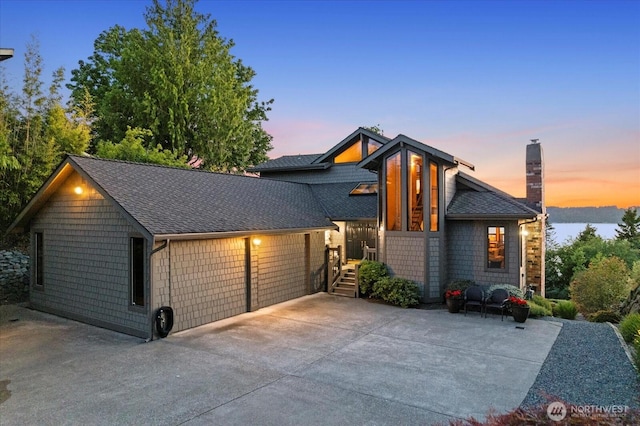 10300 64th Pl W, Mukilteo, WA 98275 - view of front of property with a chimney and roof with shingles