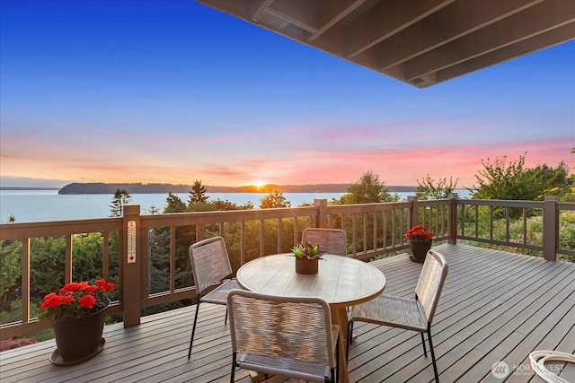 10300 64th Pl W, Mukilteo, WA 98275 - deck at dusk with outdoor dining space and a water view