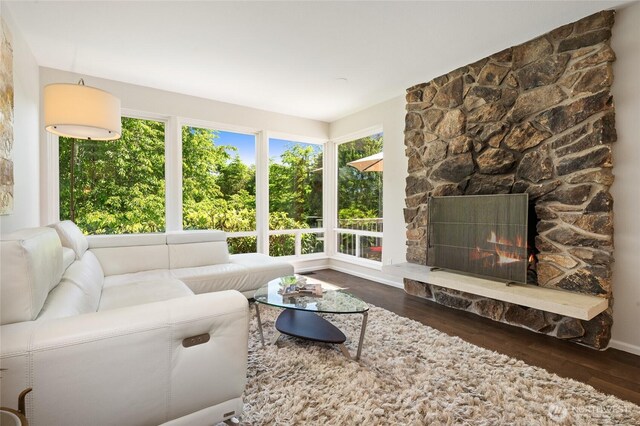 3089 W Lake Sammamish Pkwy NE, Redmond, WA 98052 - living room with wood finished floors and a stone fireplace