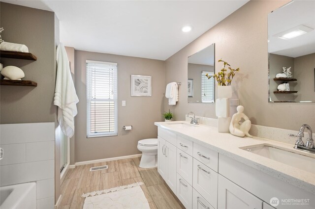 3089 W Lake Sammamish Pkwy NE, Redmond, WA 98052 - full bath with double vanity, a bath, wood finished floors, and a shower with shower door
