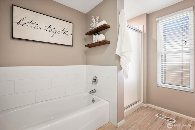 3089 W Lake Sammamish Pkwy NE, Redmond, WA 98052 - bathroom with a bath and a shower stall
