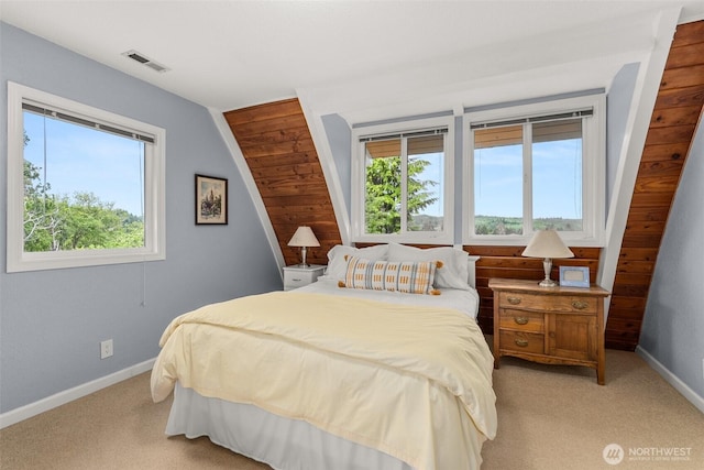 1508 Bloomhardt Rd, Raymond, WA 98577 - bedroom featuring multiple windows, light colored carpet, and lofted ceiling