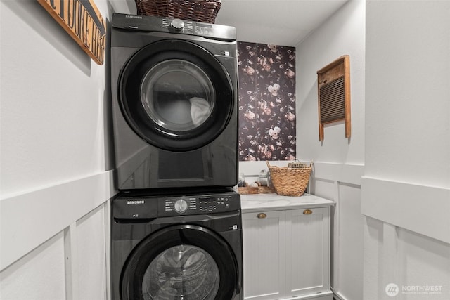 755 Elm St, Raymond, WA 98577 - washroom with estacked washer and dryer and cabinet space