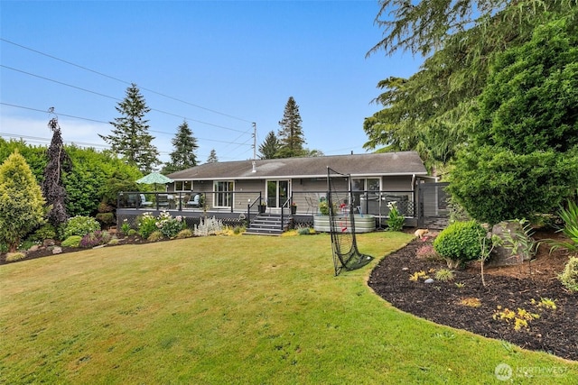 755 Elm St, Raymond, WA 98577 - rear view of property with a yard and a wooden deck
