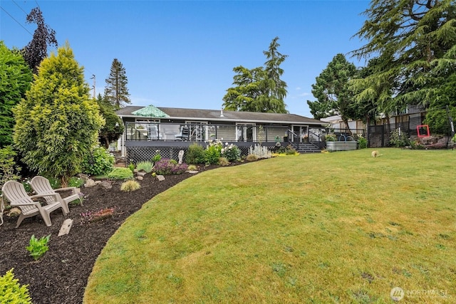 755 Elm St, Raymond, WA 98577 - view of grassy yard featuring a wooden deck