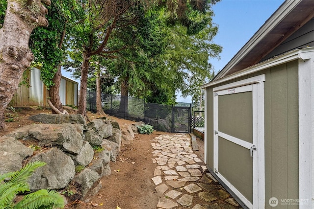 755 Elm St, Raymond, WA 98577 - fenced backyard with a storage shed