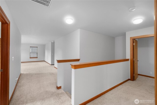 516 Emerald Ct SE, Rainier, WA 98576 - corridor with carpet floors and an upstairs landing