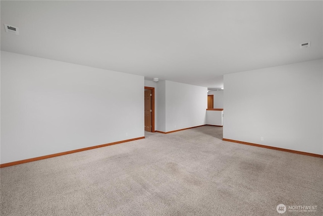 516 Emerald Ct SE, Rainier, WA 98576 - empty room with light colored carpet and baseboards