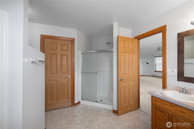 516 Emerald Ct SE, Rainier, WA 98576 - full bathroom featuring a shower stall, vanity, and tile patterned flooring