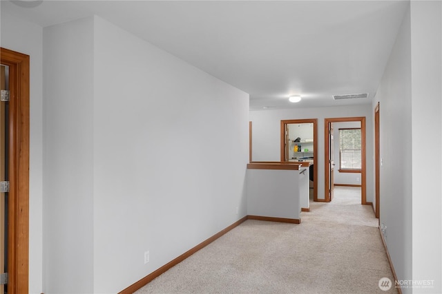 516 Emerald Ct SE, Rainier, WA 98576 - hall with light carpet and baseboards