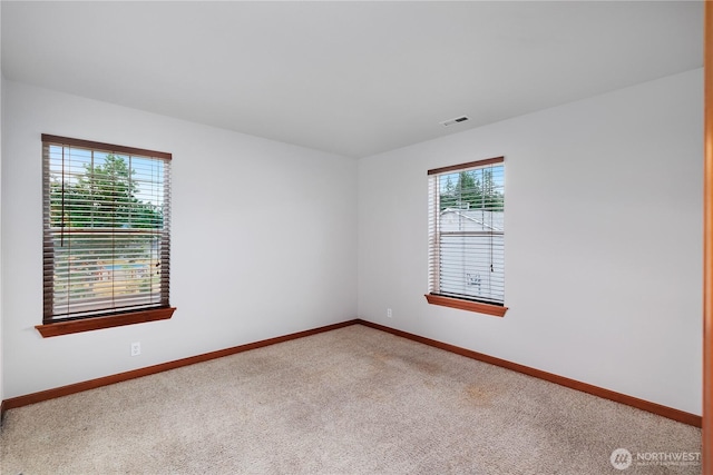 516 Emerald Ct SE, Rainier, WA 98576 - unfurnished room with carpet flooring and baseboards
