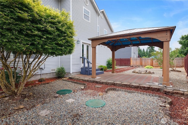 516 Emerald Ct SE, Rainier, WA 98576 - view of yard with a gazebo, entry steps, and a patio area
