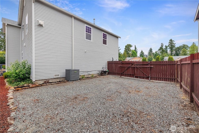 516 Emerald Ct SE, Rainier, WA 98576 - rear view of house with a gate