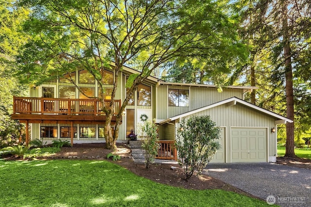 13919 SE 3rd Pl, Bellevue, WA 98005 - view of front of property with gravel driveway, an attached garage, a front lawn, and a wooden deck