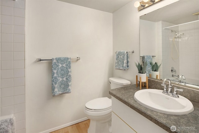 13919 SE 3rd Pl, Bellevue, WA 98005 - full bathroom featuring wood finished floors, vanity, and shower / bathtub combination