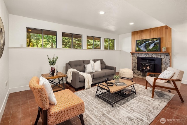 13919 SE 3rd Pl, Bellevue, WA 98005 - tiled living room featuring recessed lighting and a stone fireplace
