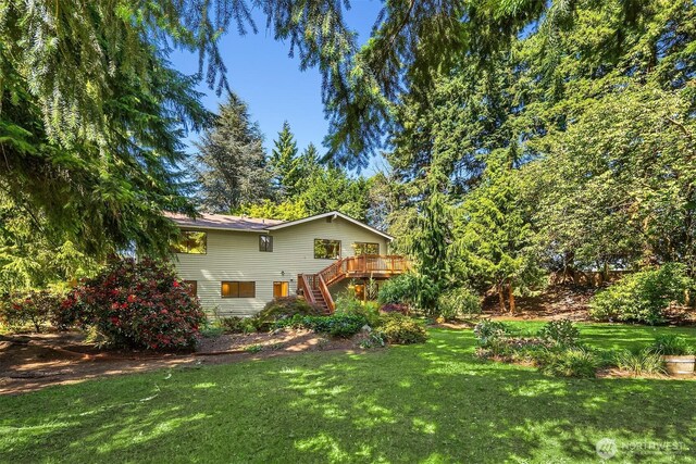 13919 SE 3rd Pl, Bellevue, WA 98005 - view of grassy yard featuring stairs and a deck