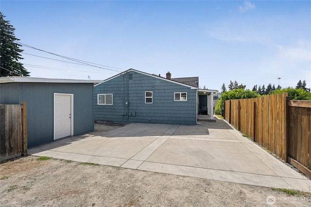 2117 S Ash St, Tacoma, WA 98405 - back of property featuring a patio area