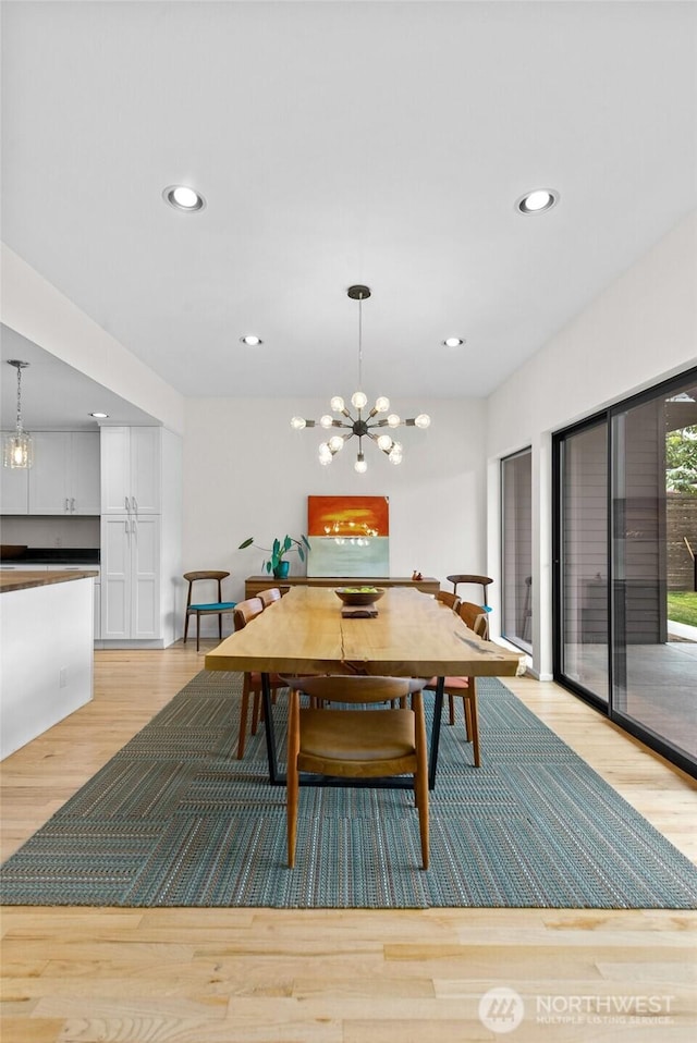 11017 Forest Ave S, Seattle, WA 98178 - dining area featuring light wood-type flooring, recessed lighting, and a chandelier