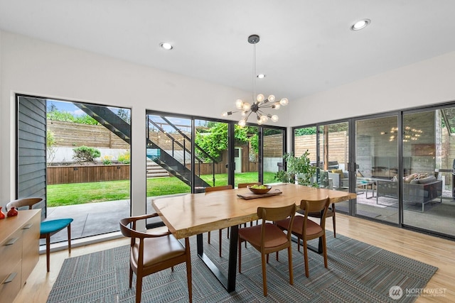 11017 Forest Ave S, Seattle, WA 98178 - dining space featuring healthy amount of natural light, light wood finished floors, a chandelier, and recessed lighting